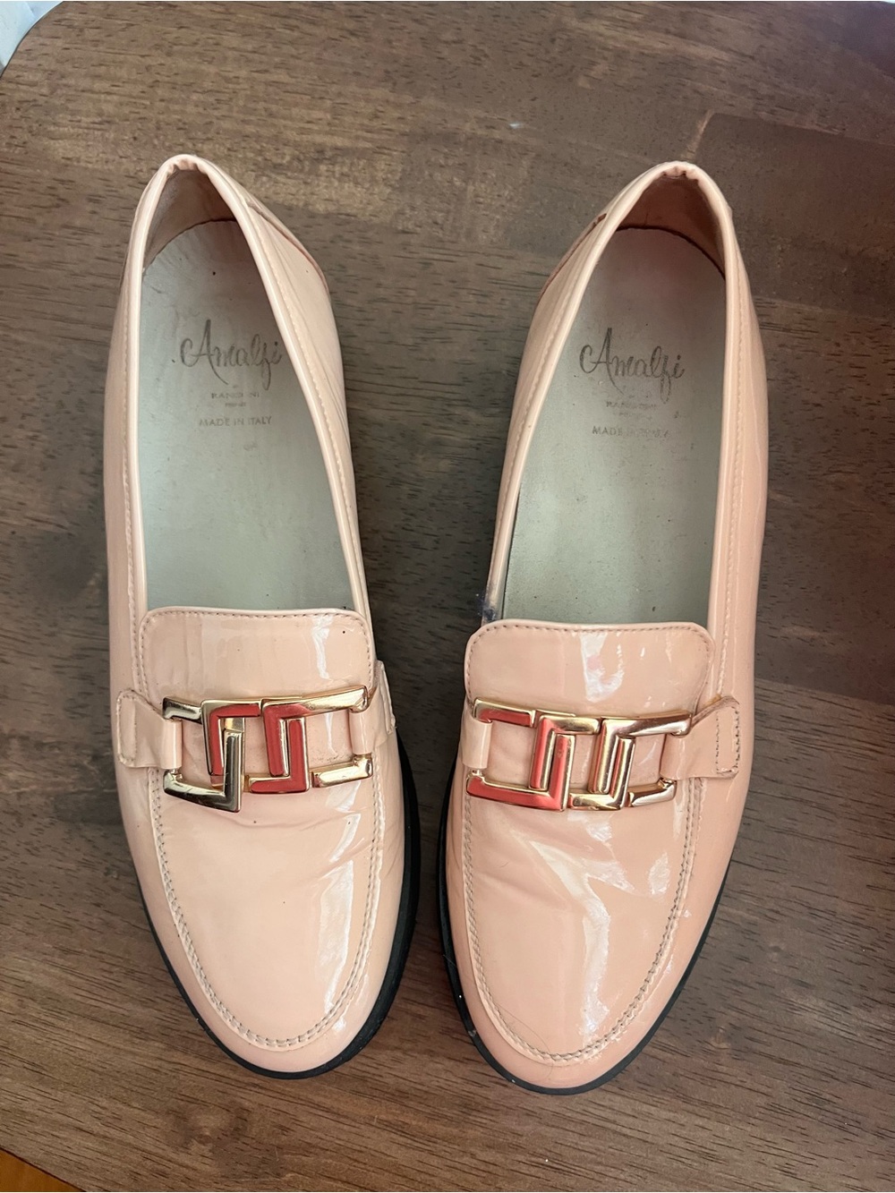 Amalfi leather loafers featuring a prominent gold-tone chain-link size 9